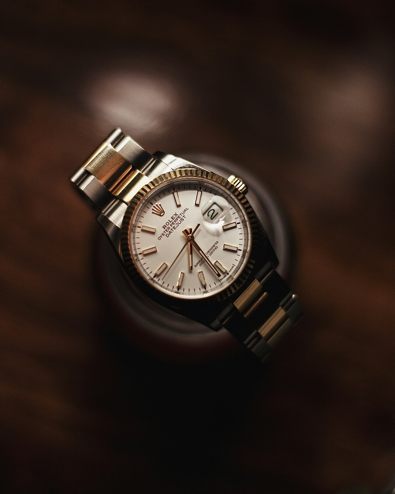 Rolex Datejust photographed in warm low light